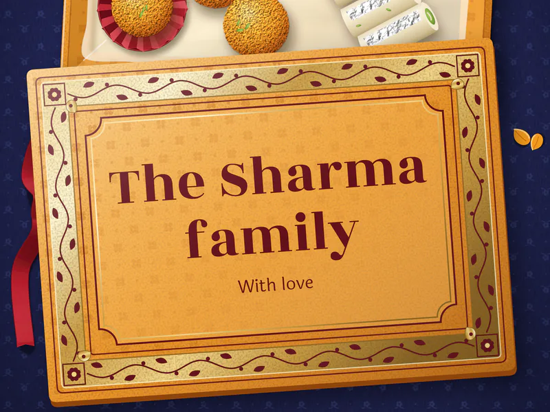 The name the Sharma family printed on the lid of a box of sweets, close up